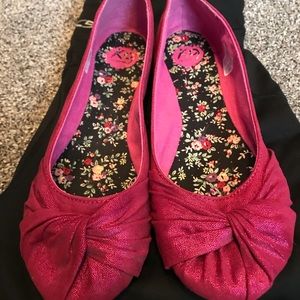 Hot pink shimmer flats.